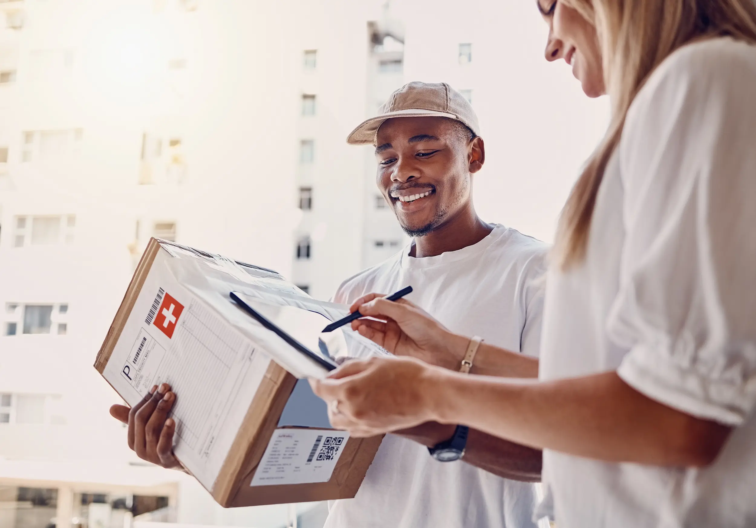 woman signing electronic proof of delivery