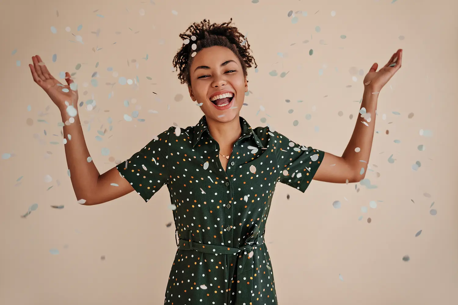 woman celebrating with confetti